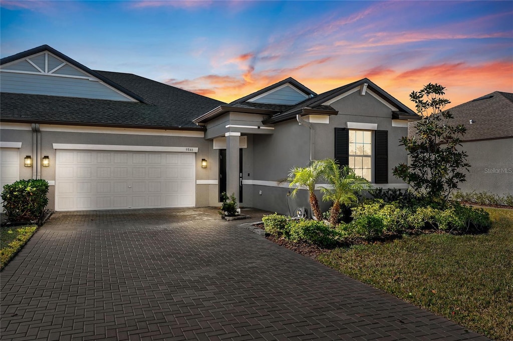 view of front of property with a garage