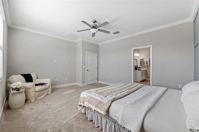 carpeted bedroom featuring ornamental molding, ceiling fan, and ensuite bath