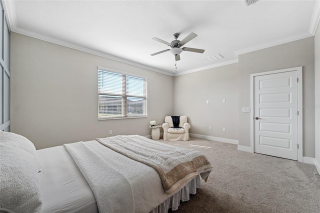 carpeted bedroom with ornamental molding and ceiling fan