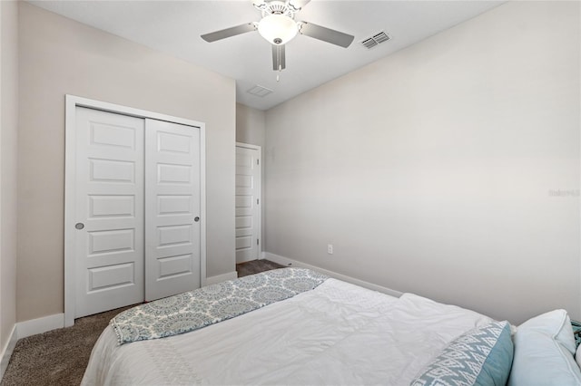 bedroom with a closet, ceiling fan, and carpet