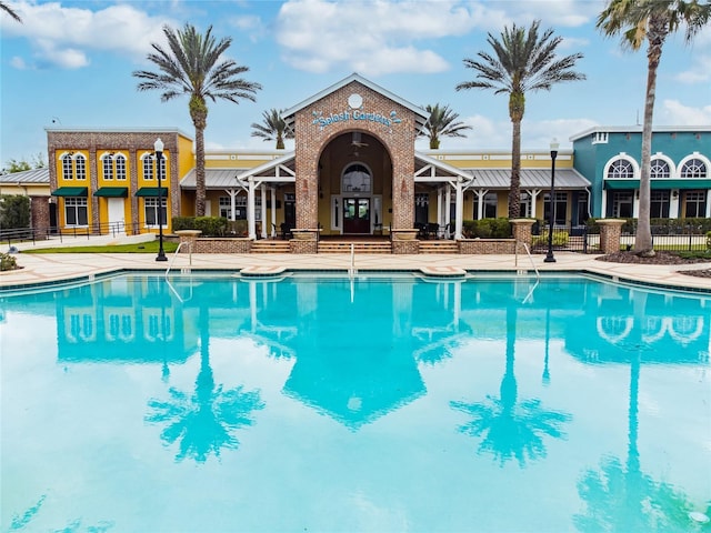 view of swimming pool featuring a patio