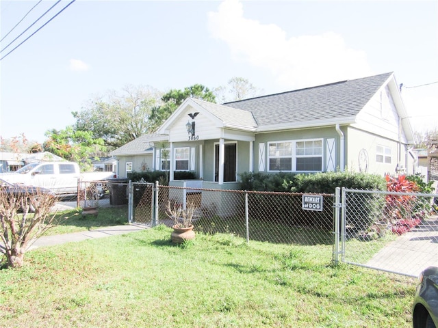 view of front of property with a front lawn