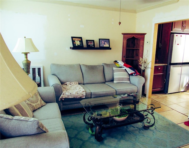 living room with light tile patterned floors and crown molding