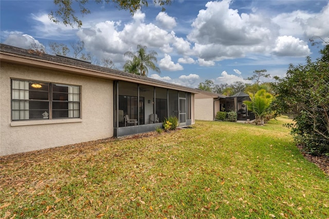 20 Sylvia Pl, Oldsmar, FL 34677 - view of grassy yard featuring a sunroom