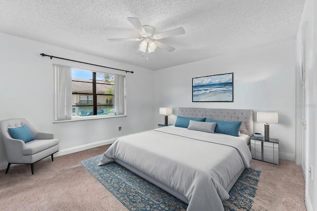 20 Sylvia Pl, Oldsmar, FL 34677 - bedroom with carpet floors, baseboards, a textured ceiling, and ceiling fan