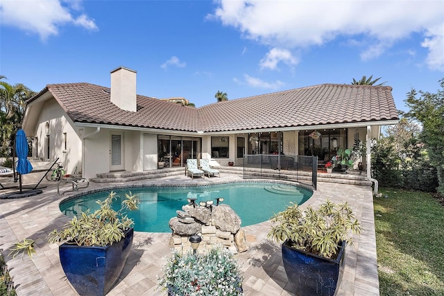 rear view of house with a patio area