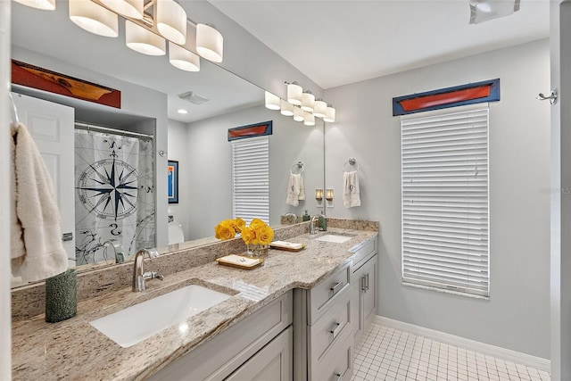 bathroom featuring vanity and tile patterned floors