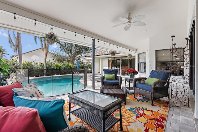 view of patio featuring an outdoor living space and a fenced in pool