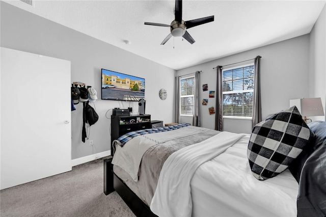 bedroom featuring carpet flooring and ceiling fan