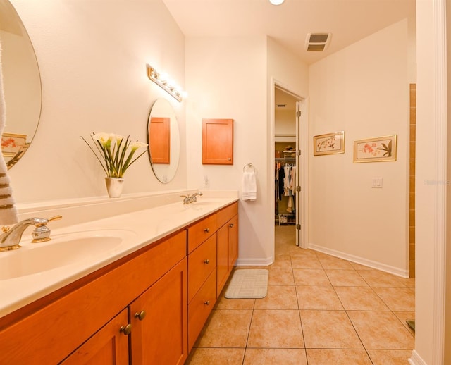 bathroom featuring vanity and tile patterned floors