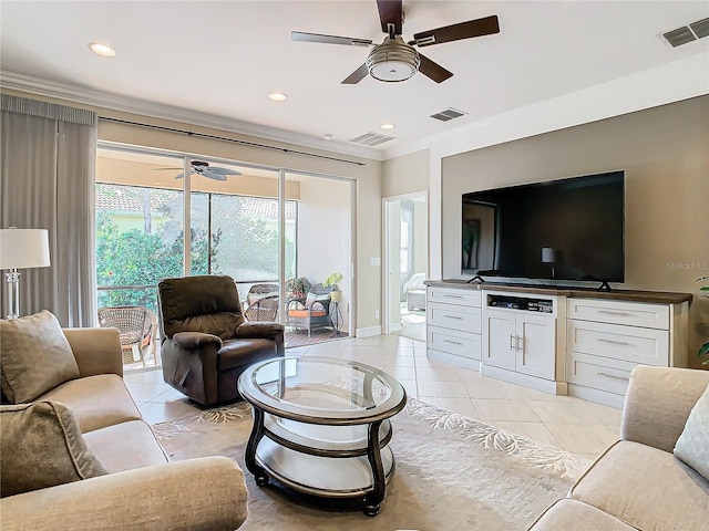 living room featuring light tile patterned floors and ceiling fan