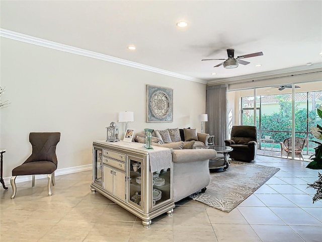 tiled living room with ornamental molding and ceiling fan