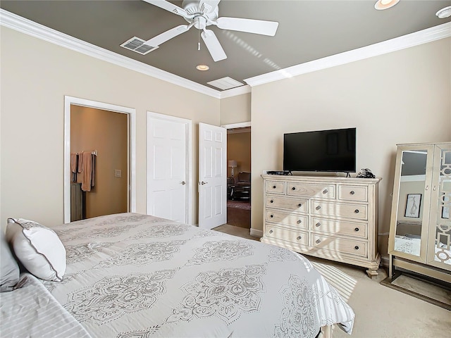 carpeted bedroom with crown molding and ceiling fan