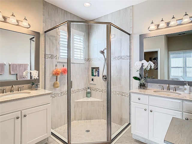 bathroom featuring vanity and walk in shower