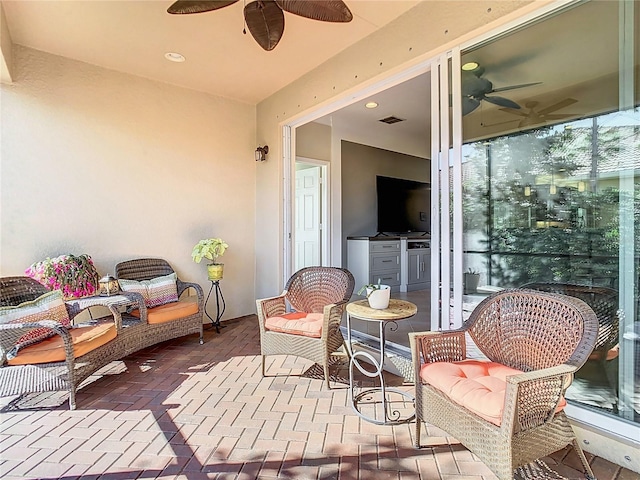 view of patio / terrace with ceiling fan