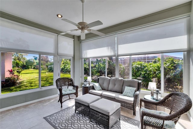 sunroom with ceiling fan