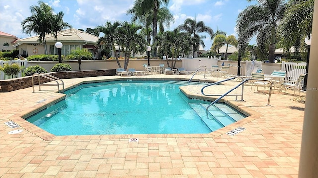 view of pool with a patio area