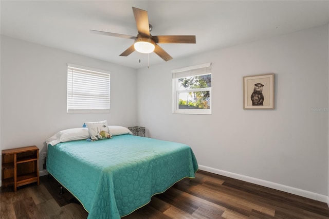 bedroom featuring dark hardwood / wood-style floors and ceiling fan