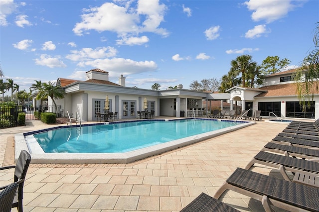 view of pool featuring a patio