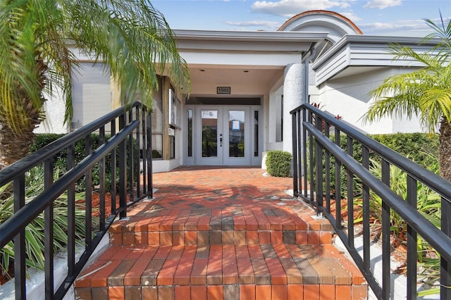 balcony featuring french doors