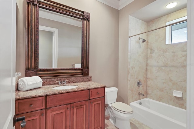 full bathroom featuring vanity, tiled shower / bath combo, crown molding, and toilet