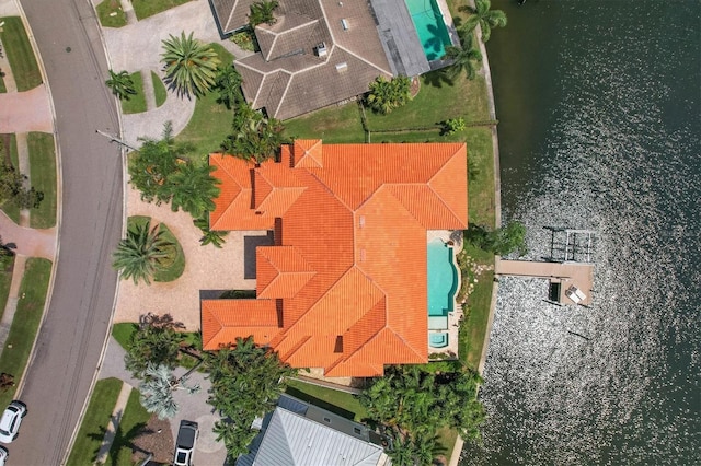 bird's eye view with a water view