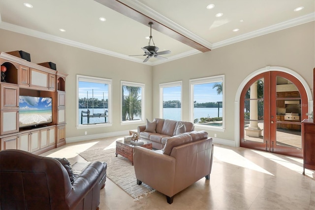 living room with crown molding, french doors, and ceiling fan