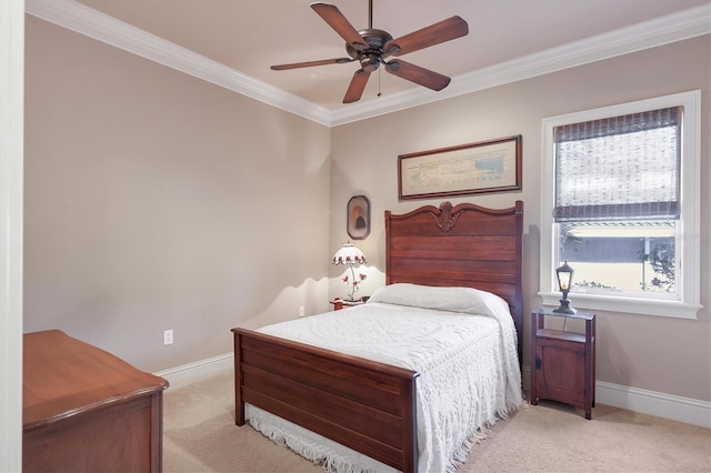 bedroom featuring ceiling fan, light colored carpet, and ornamental molding