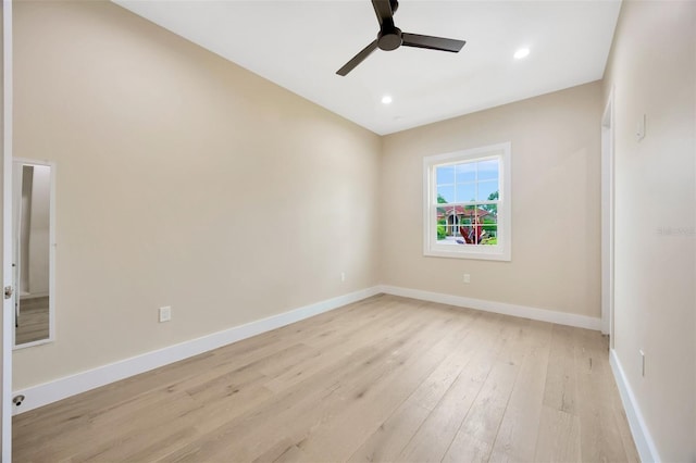 unfurnished room featuring light hardwood / wood-style floors and ceiling fan