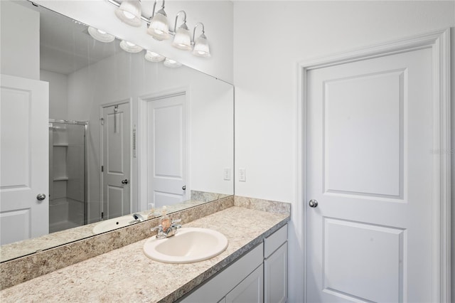 bathroom with vanity and walk in shower