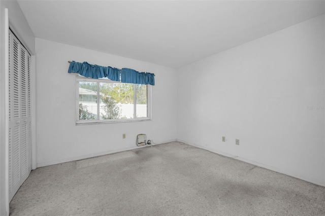 unfurnished bedroom with a closet