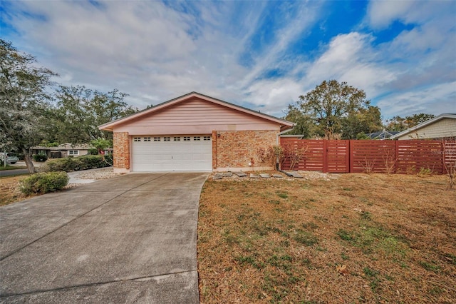 exterior space with a yard and a garage