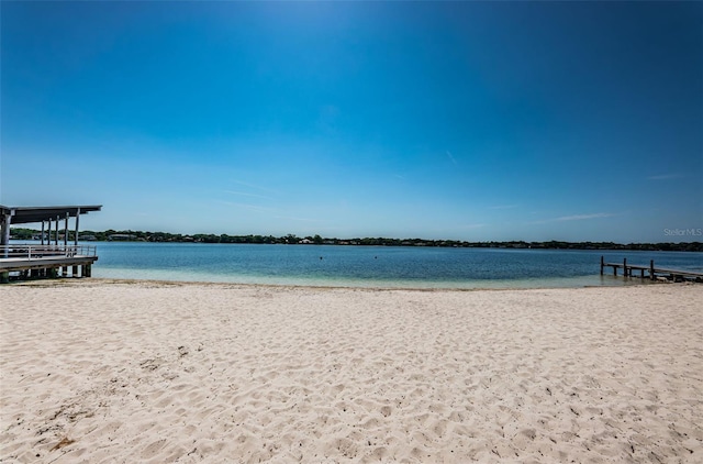 view of water feature with a beach view