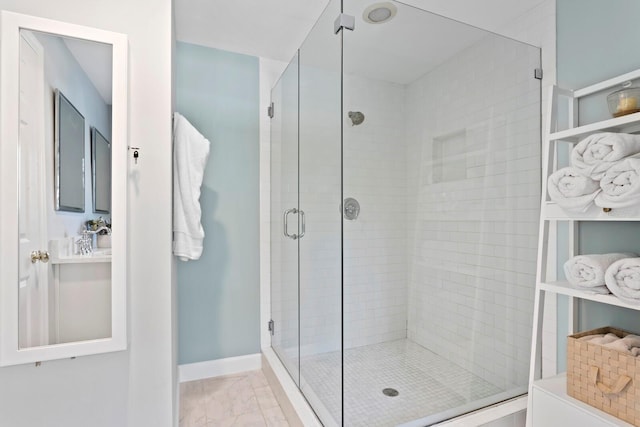 bathroom with vanity and a shower with shower door