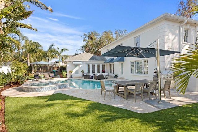 view of pool featuring a patio area