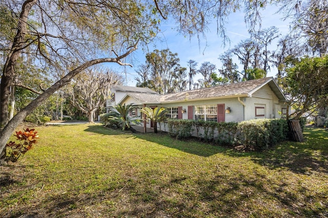 exterior space with a front lawn