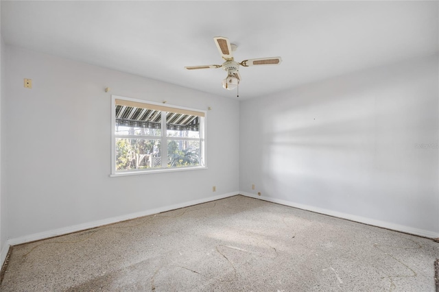 unfurnished room with ceiling fan