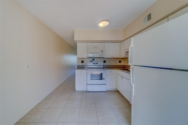 kitchen featuring white cabinetry, white appliances, tasteful backsplash, and light tile patterned floors