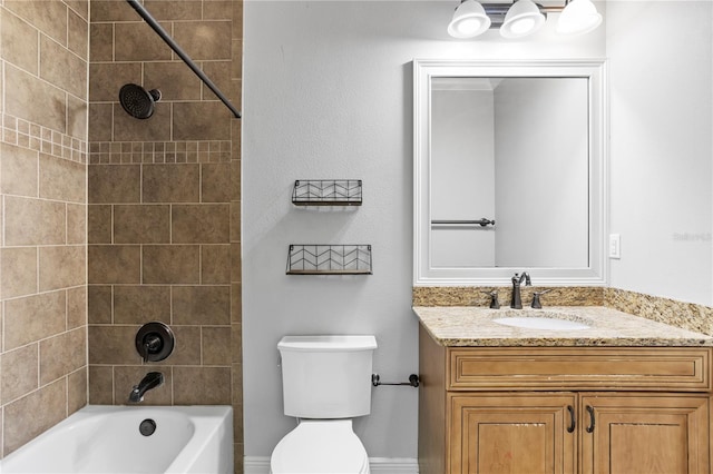 full bathroom with vanity, toilet, and tiled shower / bath combo