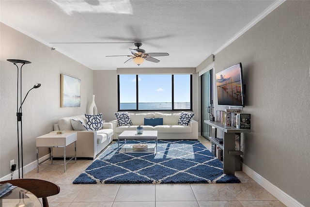 living room with crown molding, a textured ceiling, and ceiling fan