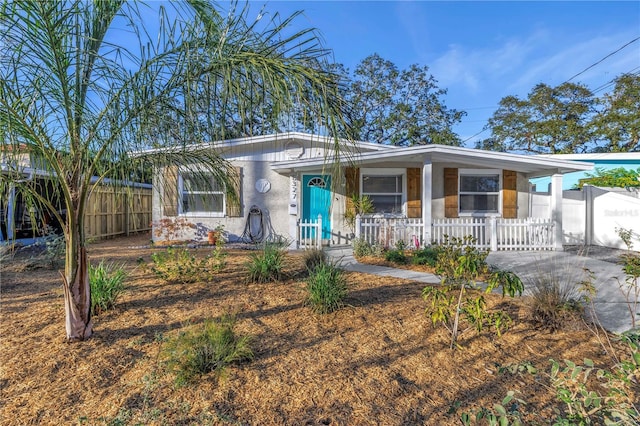 view of front of property featuring covered porch