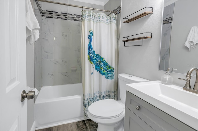 full bathroom featuring vanity, hardwood / wood-style flooring, toilet, and shower / bath combo with shower curtain