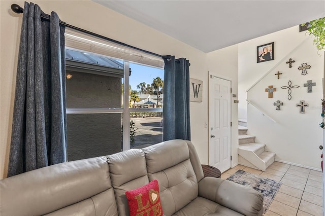 living room with light tile patterned floors