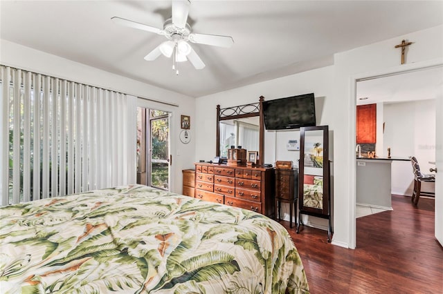 bedroom with dark wood-type flooring, ceiling fan, and access to outside