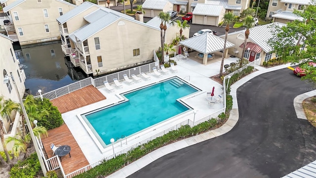 3406 Waterbridge Dr, Tampa, FL 33618 - community pool featuring a patio, fence, a gazebo, and a residential view