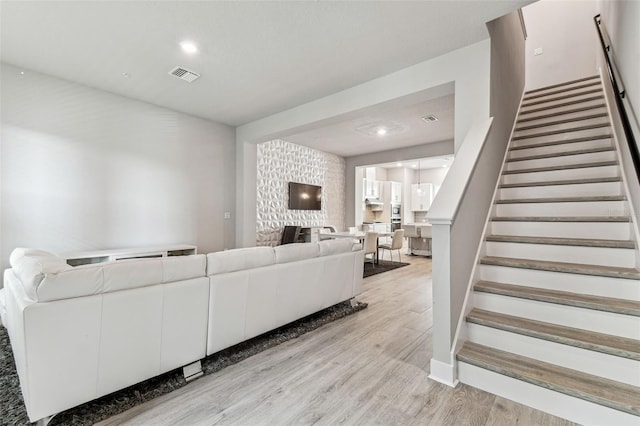 living room featuring light wood-type flooring