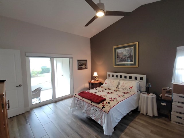 bedroom featuring high vaulted ceiling, hardwood / wood-style floors, access to exterior, and ceiling fan