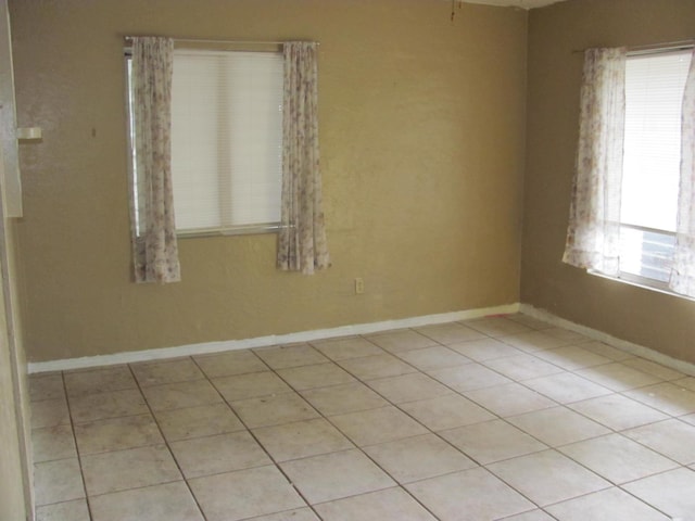 view of tiled spare room