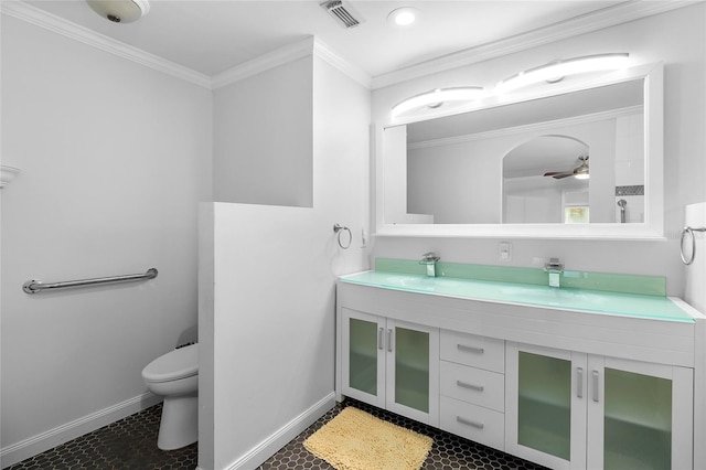 full bathroom with toilet, a sink, visible vents, and crown molding