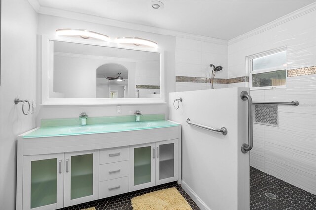 210 Lee St, Oldsmar, FL 34677 - full bathroom featuring ornamental molding, a walk in shower, a sink, double vanity, and ceiling fan